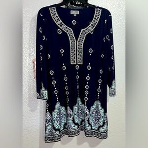 The JM Collection Woman Blouse in 1X size is a stylish and comfortable pullover